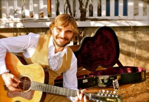 Josh Warbuton music live musician St. George Zion Springdale Kanab Utah favion josh-warburton-promo-with-truck-1200px-promo shot 1